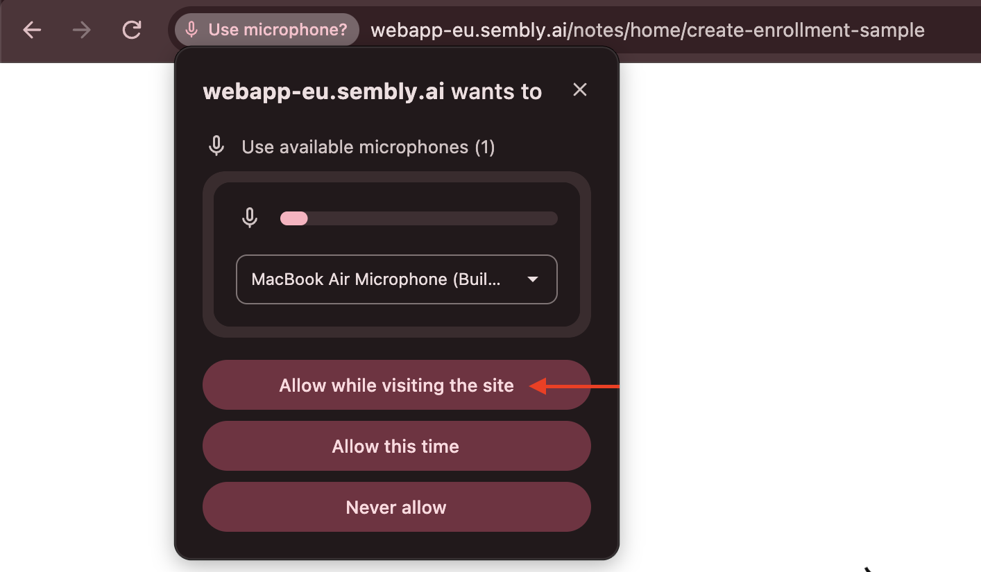 Browser microphone permission prompt for webapp-eu.sembly.ai, with a red arrow pointing to “Allow while visiting the site.”. Visible: Use microphone?, webapp-eu.sembly.ai/notes/home/create-enrollment-sample, webapp-eu.sembly.ai wants to, Use available microphones (1), MacBook Air Microphone (Buil...