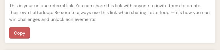 Ambassador referral card showing explanatory text and the Copy button; the referral link is outside the crop.