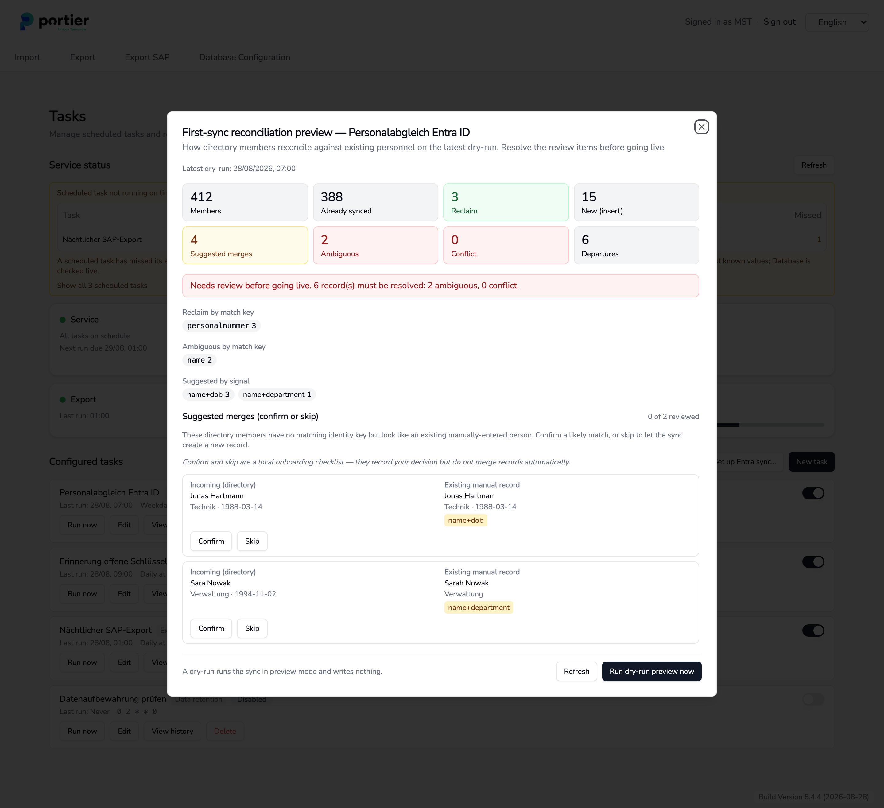 The reconciliation preview after a dry run, with the review items and the suggested merges